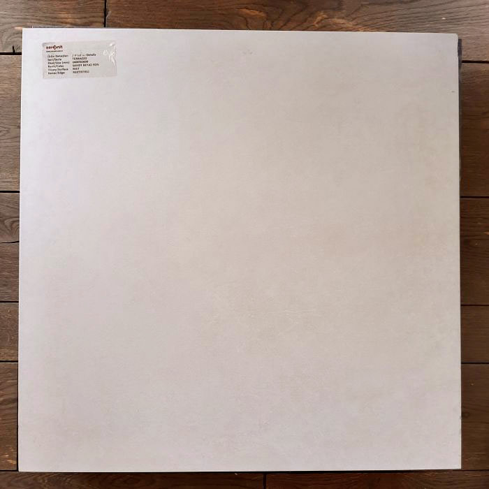 Гранитогрес 600x600 terrazzo sandy white fon mat